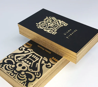 Cartes de visite personnalisées de luxe en papier couché noir recyclé, avec dorure à chaud, revêtement UV, bordure dorée et forme ovale