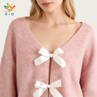 Vêtements pour femmes en gros d'usine : Cardigan élégant en polyester à col en V avec nœud, couleur unie, aspect tricoté en laine, séchage rapide et respirant
