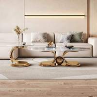 Table basse ovale de luxe avec plateau en marbre et base en acier inoxydable doré, meubles de salon, table à thé