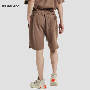 Pantalones cortos deportivos para hombre con logotipo personalizado, diseño suelto de algodón y poliéster para playa, jogging y estilo callejero - Product Image 3