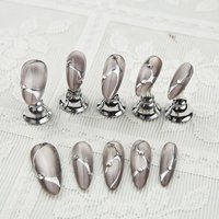 Clous à presser de style rétro faits à la main Matériau ABS avancé avec goutte d'eau Ligne d'amande Diamant Cat's Eye Flash Design français