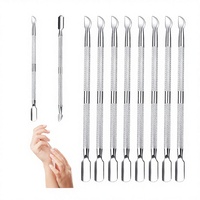 Pousse-cuticules et éliminateur de peaux mortes pour doigts et orteils en acier inoxydable à lame courbée double face