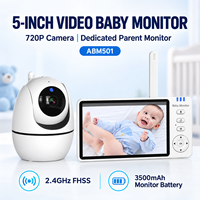 Kit de caméra de surveillance pour bébé comprenant une unité parentale, deux adaptateurs secteur, des câbles USB et un manuel d'utilisation pour les acheteurs au détail ABM501