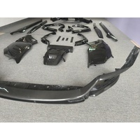 Kit de carrosserie en fibre de carbone sèche de style OEM de haute qualité pour Ferrari Purosangue : lèvre avant, jupes latérales, diffuseur arrière, couvre-cabine et kit d'arches de roue