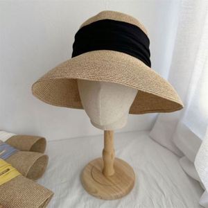 Wholesale Female <b>Straw</b> Hat With Satin Ribbon Breathable Fisherman Round Top Bowler Hat Foldable <b>Straw</b> Beach Sun Hat - Product Image 4