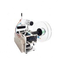 Machine d'étiquetage de bouteilles rondes pneumatique semi-automatique à fonctionnement facile pour les boissons