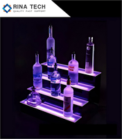 Vente en gros de présentoir en acrylique à LED Affichage à distance de bijoux/cosmétiques à intensité variable directement en usine