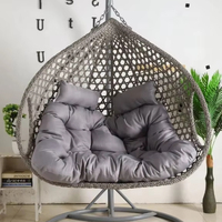 Fauteuil suspendu de luxe en acier et rotin PE pour extérieur, design double avec support et coussins, chaise œuf moderne, mobilier d'extérieur