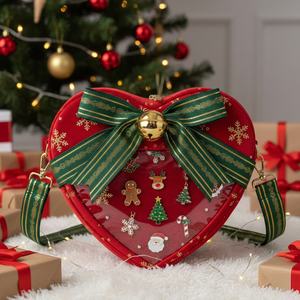 Sac à bandoulière en forme de cœur de Noël personnalisé, nouveau modèle, avec un détail de nœud en flocon de neige fantaisiste, fenêtre transparente, sac Ita en forme de cœur - Product Image 1