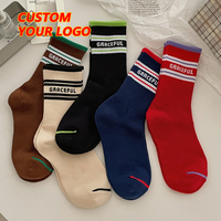 Chaussettes de sport personnalisées de haute qualité, tendance, de marque, à motif jacquard, pour jeunes, en gros