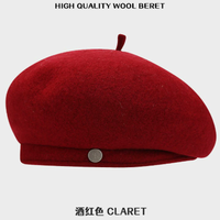 Chine Xinxing nouveau Style minimaliste à large bord 100% laine à la mode polyvalent métal Logo artiste casquette béret chaud pour une utilisation en extérieur