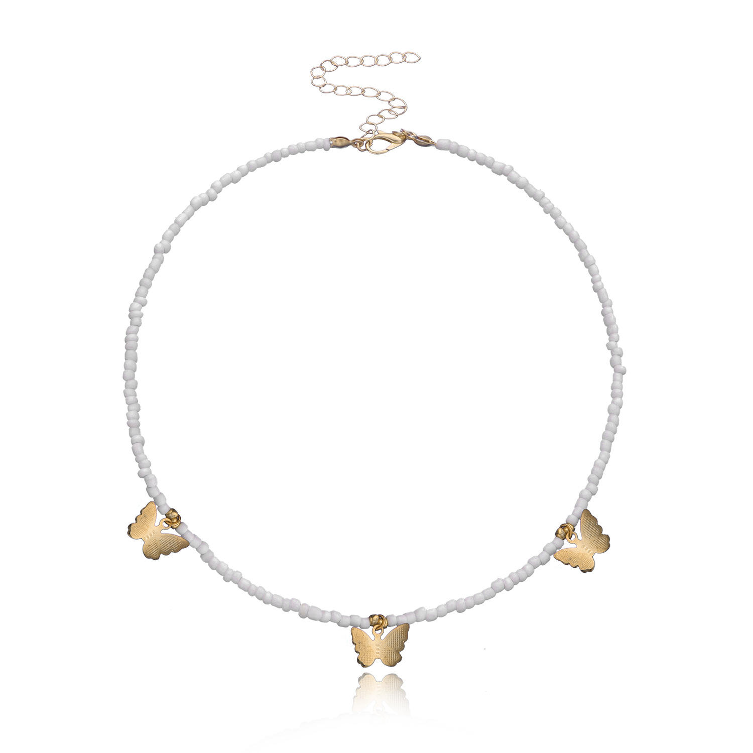 ผีเสื้อสีทอง2เม็ดสีขาวข้าว