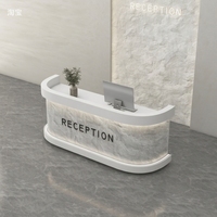 Comptoir de réception moderne aspect pierre, motif marbre de luxe avec éclairage LED pour salon de coiffure et boutique de vêtements haut de gamme