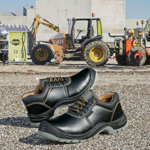 Botas de seguridad de cuero de fábrica unisex Diseño de cordones de corte bajo Durable antideslizante con punta de acero Maquinaria Zapatos de trabajo de seguridad - Product Image 1