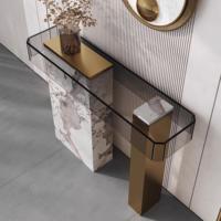 Console d'entrée moderne de style italien en acier inoxydable de luxe léger avec panneau mural en pierre pour villas et salons d'hôtels