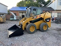 En utilisant la chargeuse sur pneus Cater 246C, la mini chargeuse de direction antidérapante de haute qualité CAT 246 246D 246D3 est vendue à bas prix