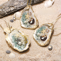 Ensemble de 3 ornements en coquille d'huître avec étoiles de mer et perles, faits à la main avec des coquillages naturels et une corde dorée