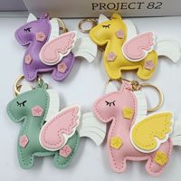 Nouveau porte-clés licorne cousu main double face multi-couches, pendentif de sac Kawaii en cuir PU, porte-clés poney ailes de cheval volant