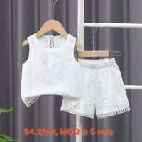 Ensemble deux pièces en polyester pour filles, style occidental, tendance influenceur, nouvelle collection été 2025, avec débardeur en dentelle ajourée et short