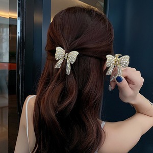 Bowknot Pearl Accesorios para el <span class=keywords><strong>cabello</strong></span> Horquilla elegante Clip de agarre que combina con todo Chica Larga Rhinestone Bowknot Horquilla para el <span class=keywords><strong>cabello</strong></span> - Product Image 1