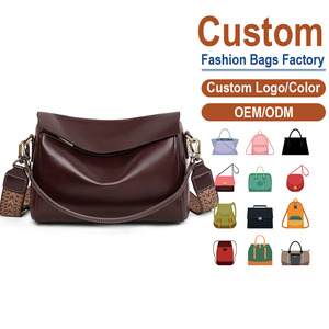 Bolso bandolera de cuero genuino de grano completo de inspiración vintage, diseño elegante en color burdeos con correa tejida para mujer, fabricado a medida. - Product Image 1