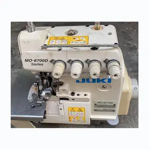 Used JUKIs 6714 2 needle 4 thread overlock sewing machine industrial garment clothing sewing machine