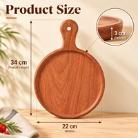Planche à pizza et à steak ronde en bois d'ébène avec poignée et rebord pour servir pizza, pain, fromage, fruits, planche de service pour la maison, la cuisine et la table