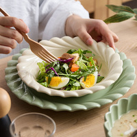 Assiettes à dîner uniques en Offre Spéciale vaisselle en porcelaine pour restaurants haut de gamme assiettes à poisson ovales en céramique de 12.25 pouces en vrac