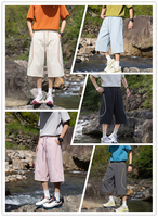 Ensemble unisexe UPF50+ en polyester : haut capri 7/8 et short court, col montant, coupe ample, fermeture éclair, séchage rapide, pour adultes