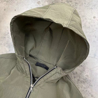 Veste coupe-vent en nylon ripstop à carreaux avec capuche à revers élastique personnalisée par le fabricant pour hommes