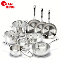 Ensemble de casseroles TIANXING, compatible lave-vaisselle et four, en acier inoxydable triple couche, fabrication allemande, de qualité supérieure, pour une cuisson luxueuse.