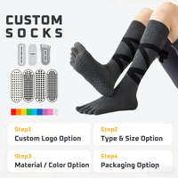 Chaussettes de yoga noires montantes à cinq doigts avec sangles et points antidérapants en silicone, effet amincissant pour les jambes, idéales pour le Pilates