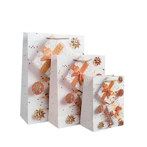 क्रिसमस उपहार पैकेजिंग फैक्टरी के लिए सस्ते बैग को अपने लोगो या पैटर्न पेपर उपहार बैग के साथ मुद्रित किया जा सकता है
