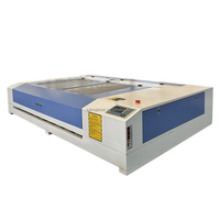 El diseño compacto de Julong ocupa un espacio mínimo de escritorio mini 1390 1610 máquina de grabado de corte láser CO2 para tela acrílica de madera