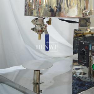 Machine <span class=keywords><strong>de</strong></span> remplissage <span class=keywords><strong>de</strong></span> rouge à lèvres <span class=keywords><strong>de</strong></span> chauffage et <span class=keywords><strong>de</strong></span> mélange Henwi 1 tête pour <span class=keywords><strong>le</strong></span> remplissage à chaud précis du <span class=keywords><strong>baume</strong></span> à lèvres, du rouge à lèvres et des cosmétiques à base <span class=keywords><strong>de</strong></span> cire. - Product Image 3