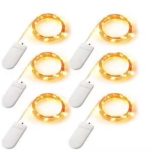 Luces de hadas de alambre de cobre con pilas de 1m y 10 <span class=keywords><strong>LED</strong></span> Luces de cadena estrelladas de Navidad con CR2032 para decoraciones festivas - Product Image 1