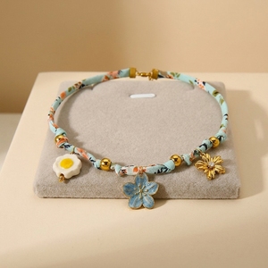 Collar <span class=keywords><strong>de</strong></span> Mujer Estilo Bohemio Fatingna, Tela y Seda <span class=keywords><strong>con</strong></span> Acero Inoxidable, Cerámica, Circonita Cúbica, Flor Azul, Collar Moderno - Product Image 1