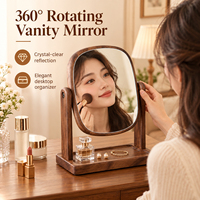 Miroir de vanité en noyer noir avec cadre en bois cintré, support à deux pieds et base de rangement pour la maison, la chambre, la coiffeuse, le maquillage et les soins de la peau