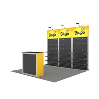 Stand d'exposition modulaire en aluminium portable 10x10 avec étagères pour salon professionnel