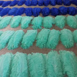 Plumas de avestruz personalizadas teñidas amarillas crudas para decoración de fiesta de alta calidad promocional en pluma para carnaval