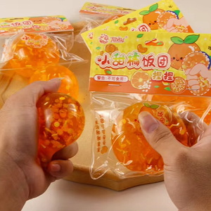 Balle anti-stress à presser en pectine, orange, à paillettes, mignonne et amusante, style Kawaii, en boîte, unisexe, pour enfants - Product Image 1