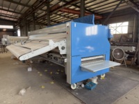 Machine automatique de pliage de drap de lit 2250W 380V équipement de blanchisserie d'hôtel pour le service de linge