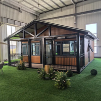 Maison pliante préfabriquée en conteneur extensible Petite maison moderne Panneau sandwich de 20 pieds Maison pliable de luxe
