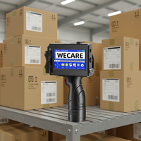 Machine d'impression portable à jet d'encre à séchage rapide WECARE pour le codage de la date de péremption sur les bouteilles