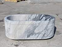 Baignoire autoportante ovale en marbre naturel – Luxueuse baignoire moderne pour salle de bain intérieure