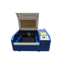 ActionLasers Graveur et découpeur laser CO2 CNC portable mini pour bois, métal, cuir, caoutchouc, papier - Refroidissement par eau, prise en charge DXF