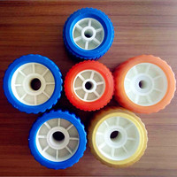 Rouleaux oscillants en matériau PP PU bleu/noir à bas prix pour remorques de bateaux Pièces et accessoires de remorque de haute qualité à vendre