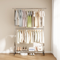 Porte-vêtements robuste OEM, support de vêtements en métal à forte capacité de charge avec roues et étagères robustes, barre centrale réglable