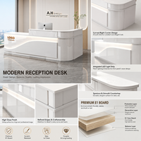 Bureau de réception moderne et élégant en forme de L avec éclairage LED ambiant, comptoir de caisse pour bureau d'entreprise, hôtel, centre commercial, salle de sport