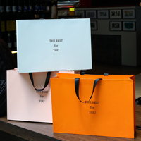 Sacs en papier d'art de luxe en gros pour vêtements, chaussures, chaussettes, cadeaux de détail, avec logo personnalisé, ruban, accessoires, impression offset de luxe
